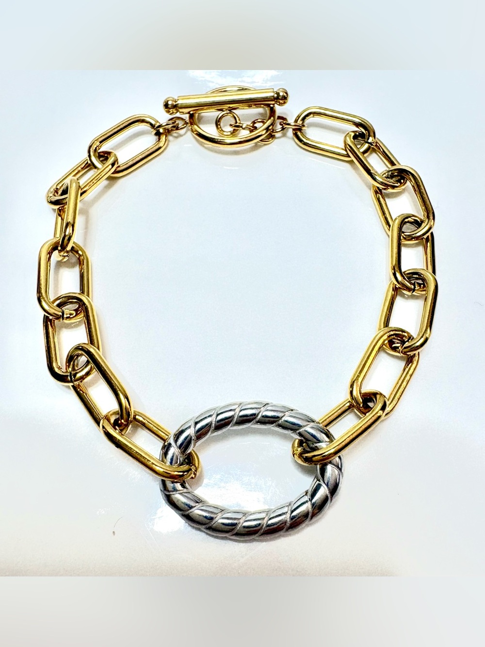 18k gold plated mixed gold and silver tone toggle bracket.